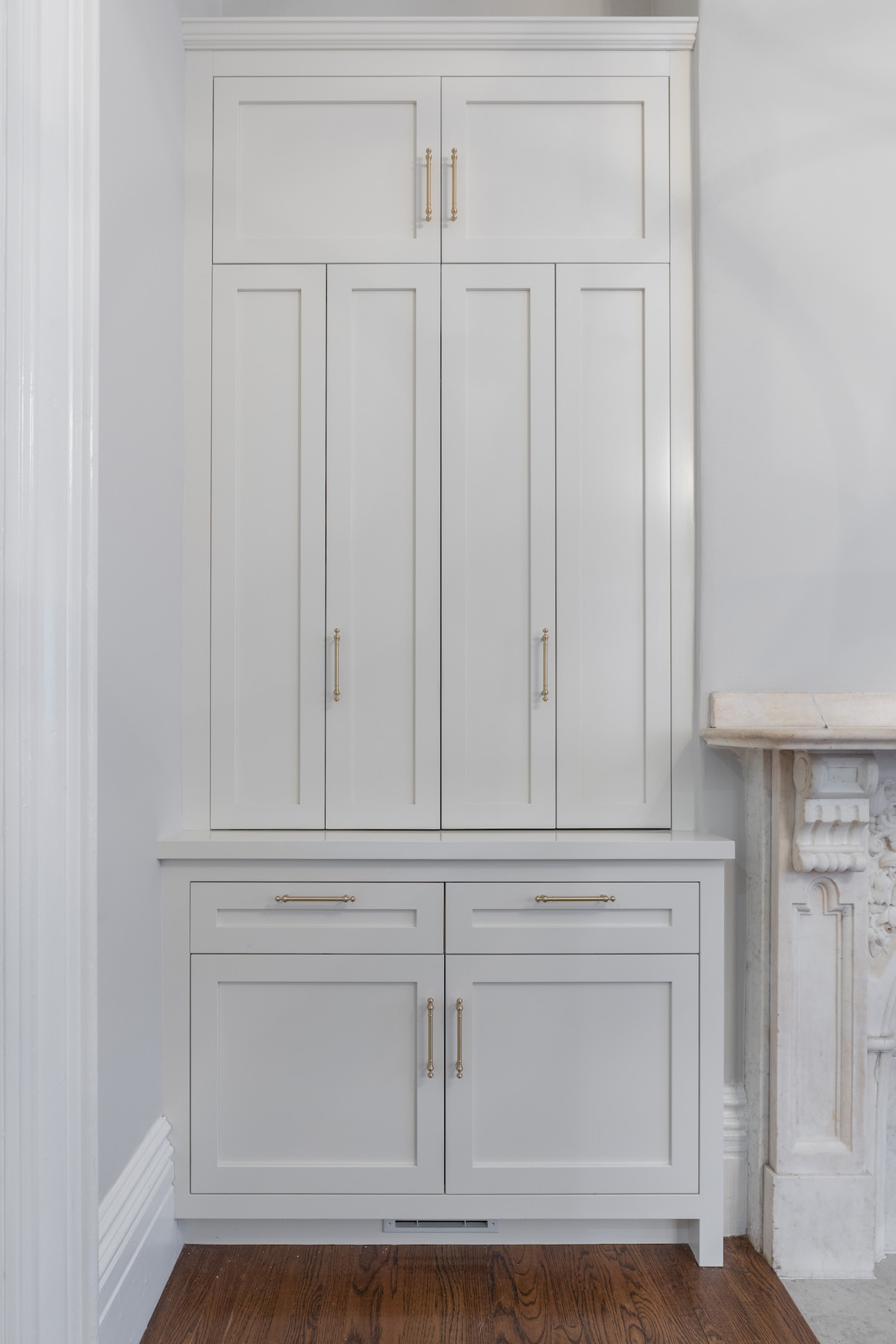 41 Upton tall cabinet by mantel