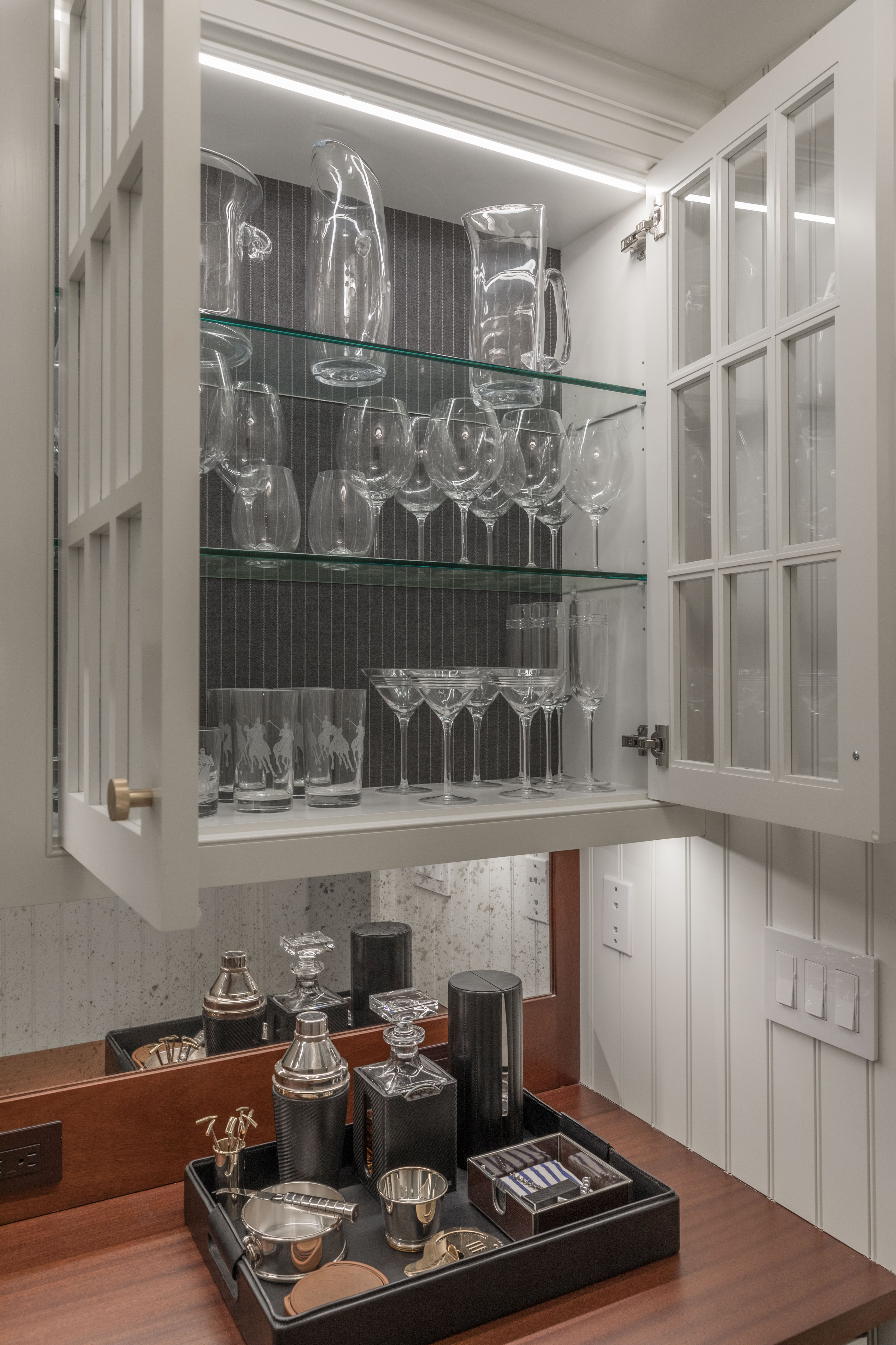 Four Seasons glass cabinet barware
