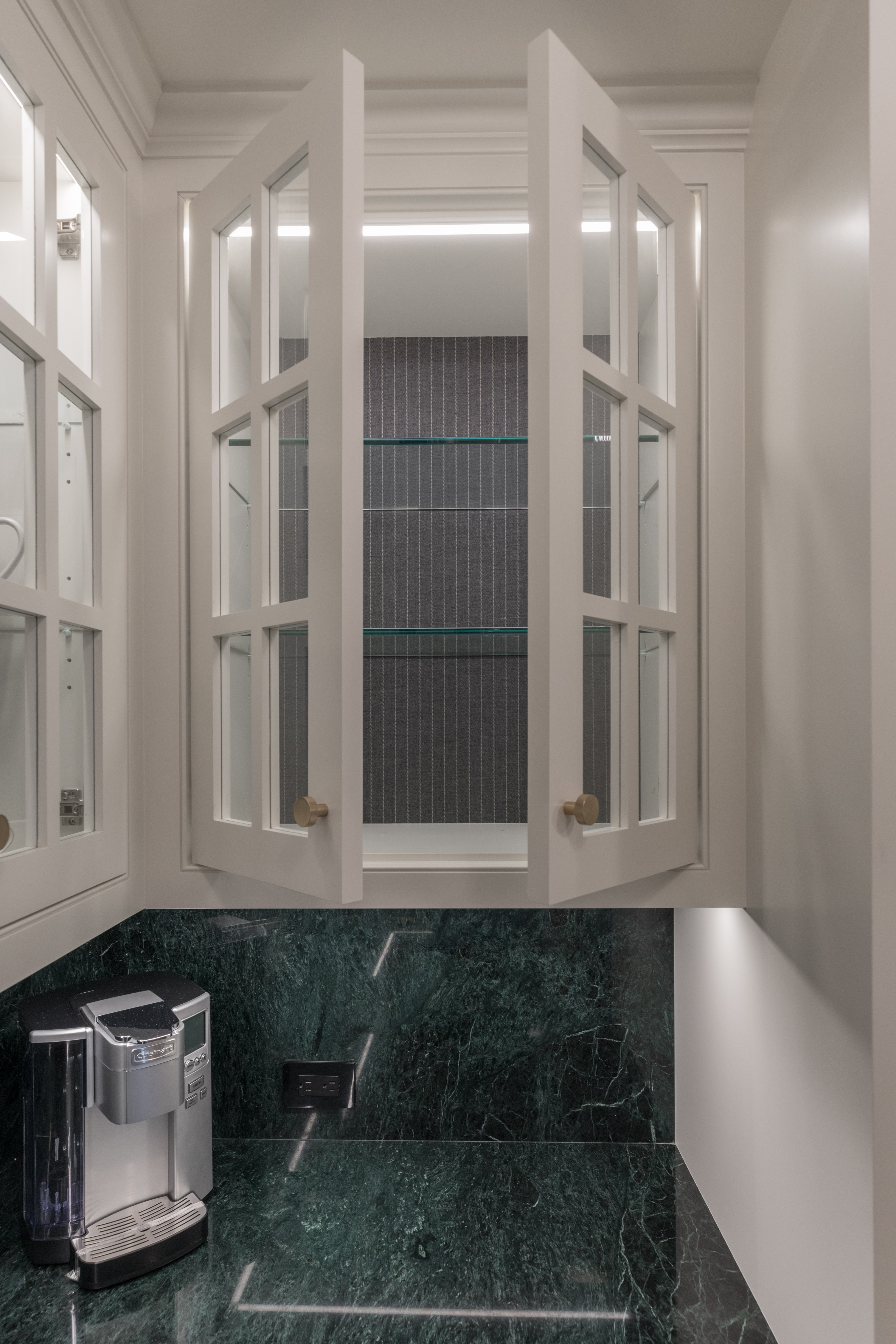 Four Seasons glass cabinet open