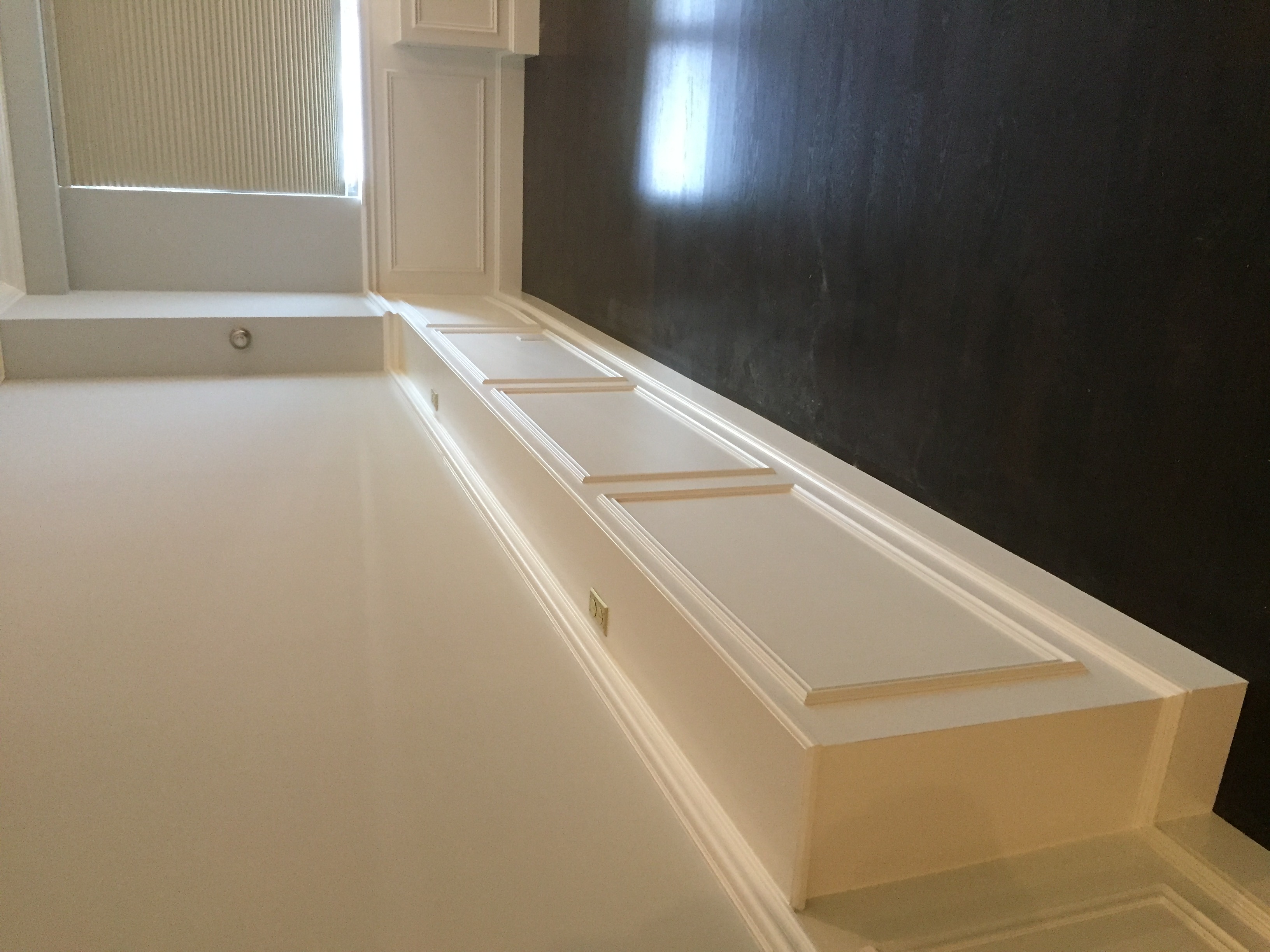window bench paneling progress 02