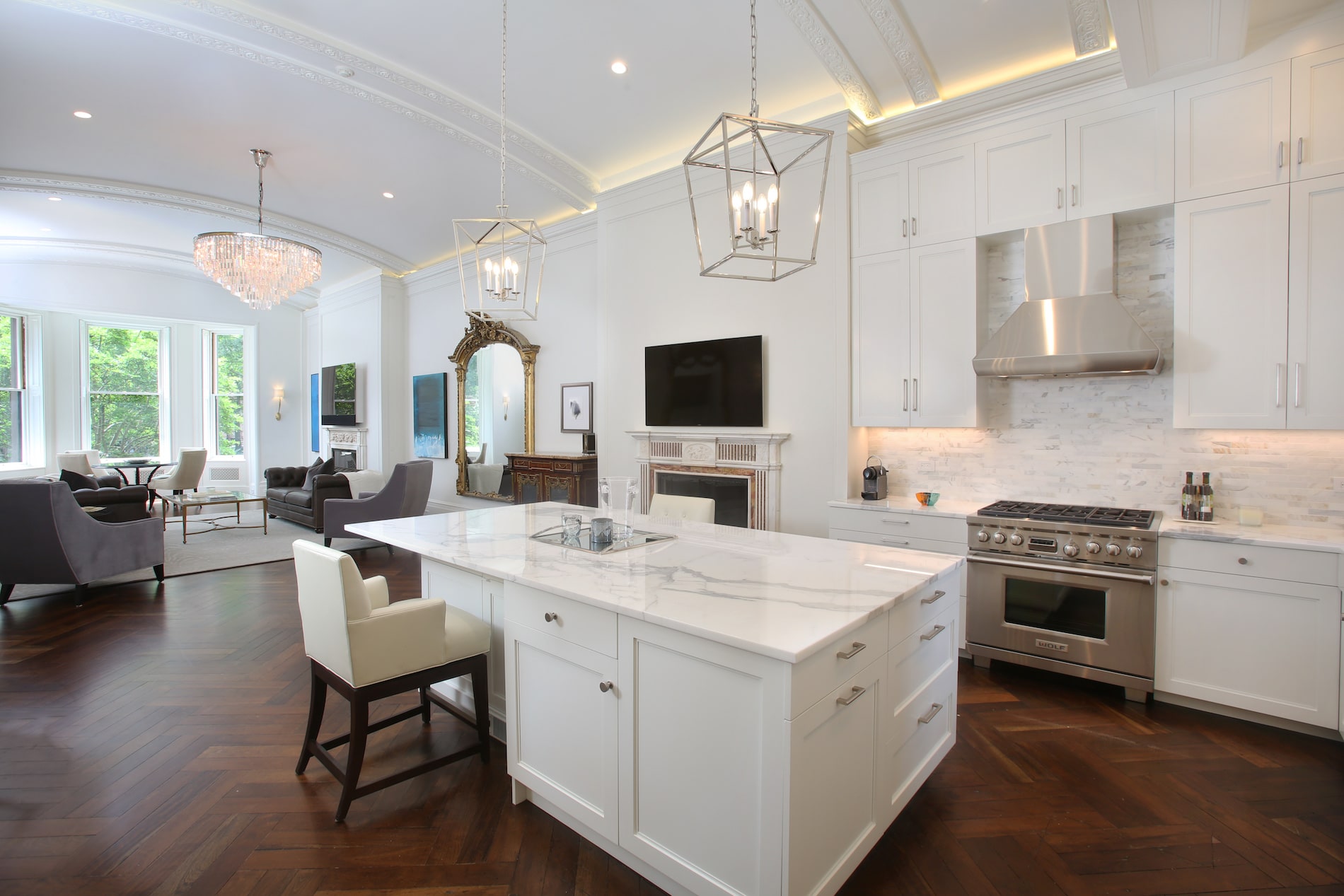 Commonwealth Avenue residence great room with arched ceiling and marble island