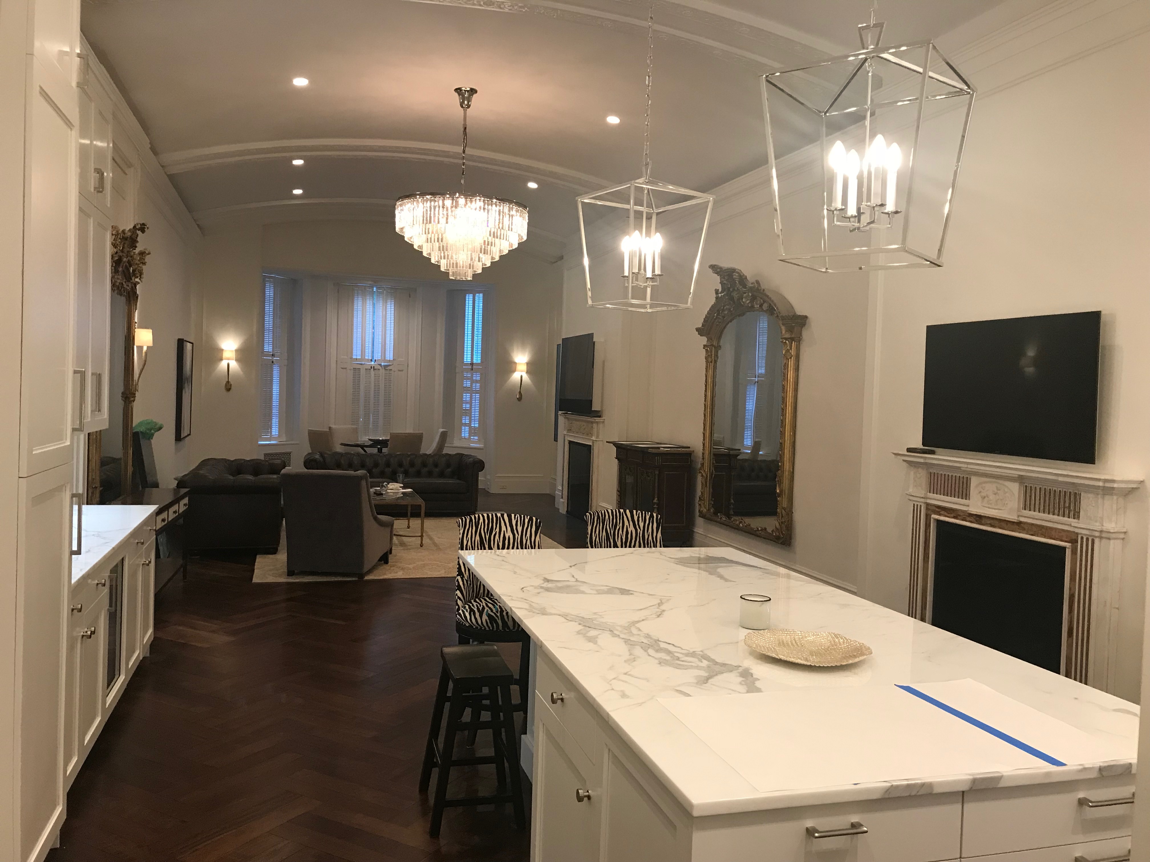 Commonwealth Avenue residence great room with marble island and arched ceiling